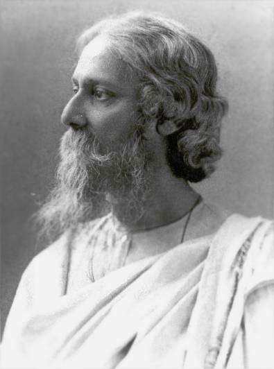 A black-and-white portrait of Rabindranath Tagore, a bearded man with long hair, looking to the right. He is wearing traditional Indian clothing, likely a robe or shawl.
