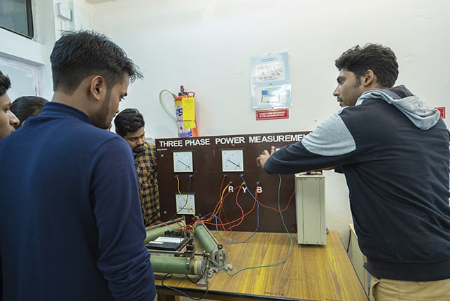 Electrical engineering Students are working in Electrical Measurement Lab
